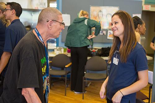 Student with community member